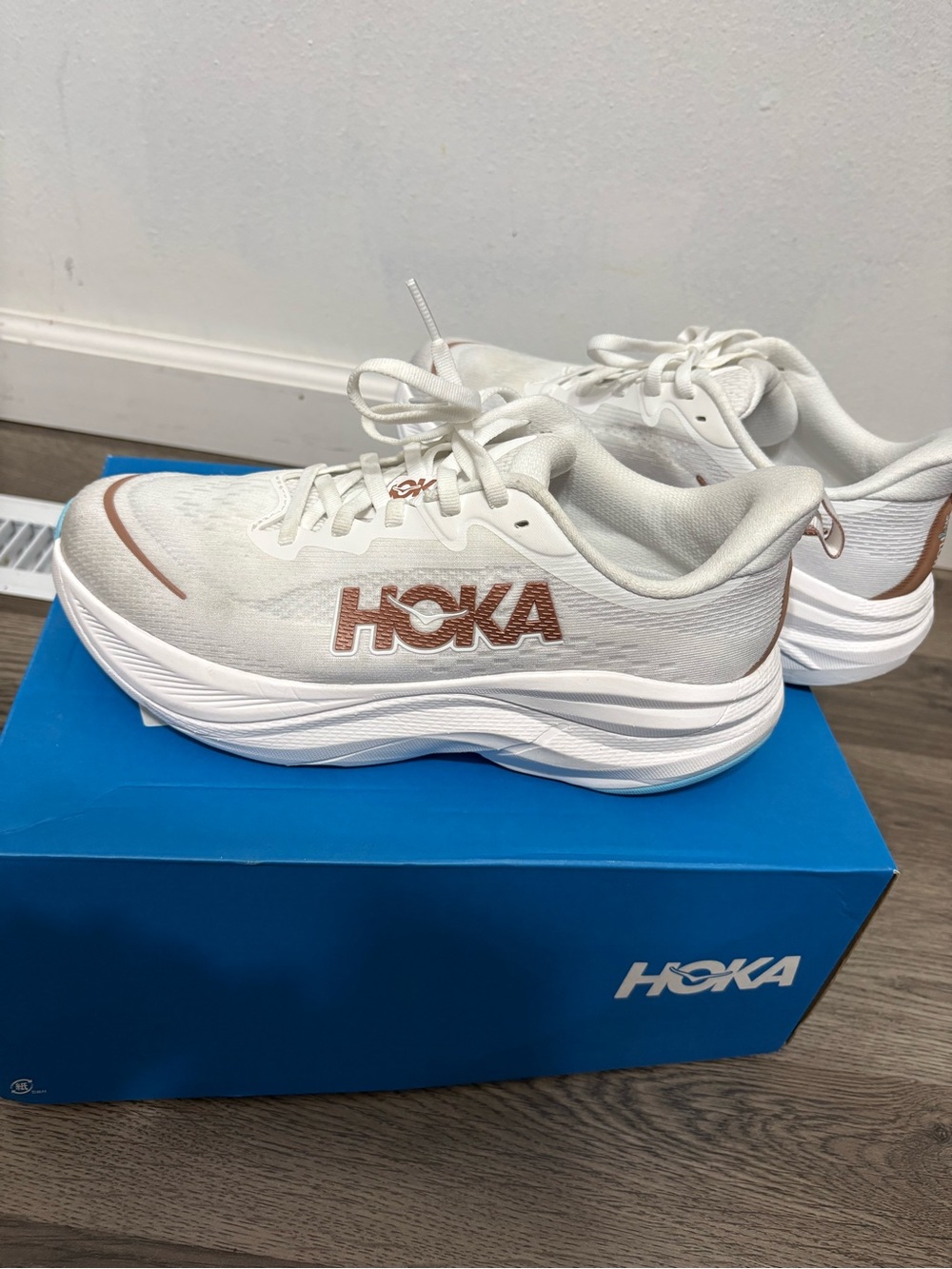 Hoka Women's White Running Shoes with Rose Gold Logo